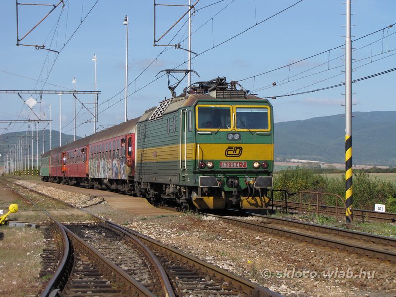 163 084-7
