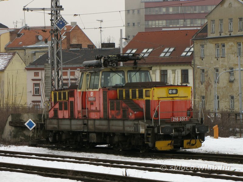 210 031-1