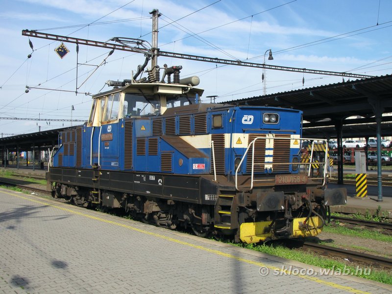 210 058-4